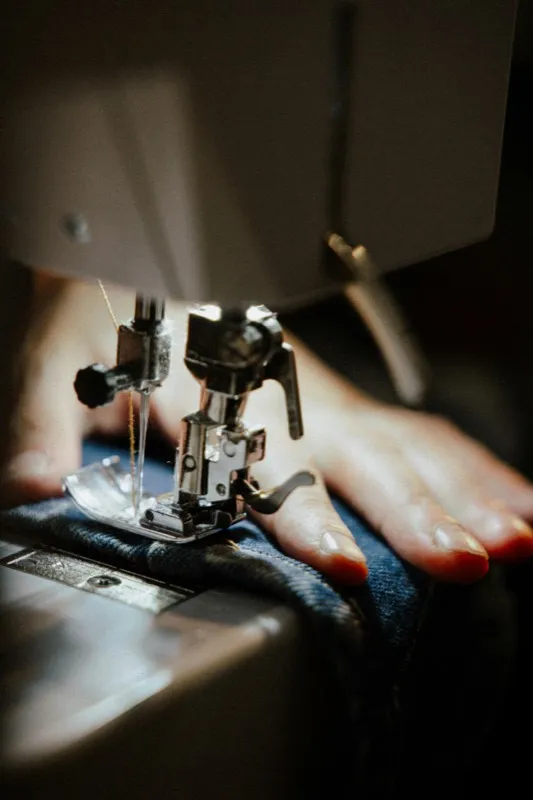 Seamstress working at a sewing machine
